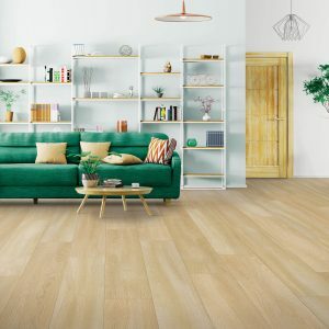 Green sofa on laminate floor | Dary Carpet & Floors